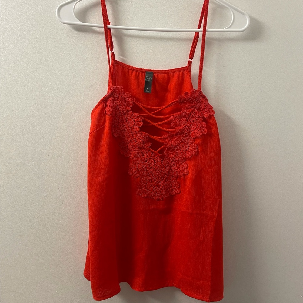 Red top with cute lacing details